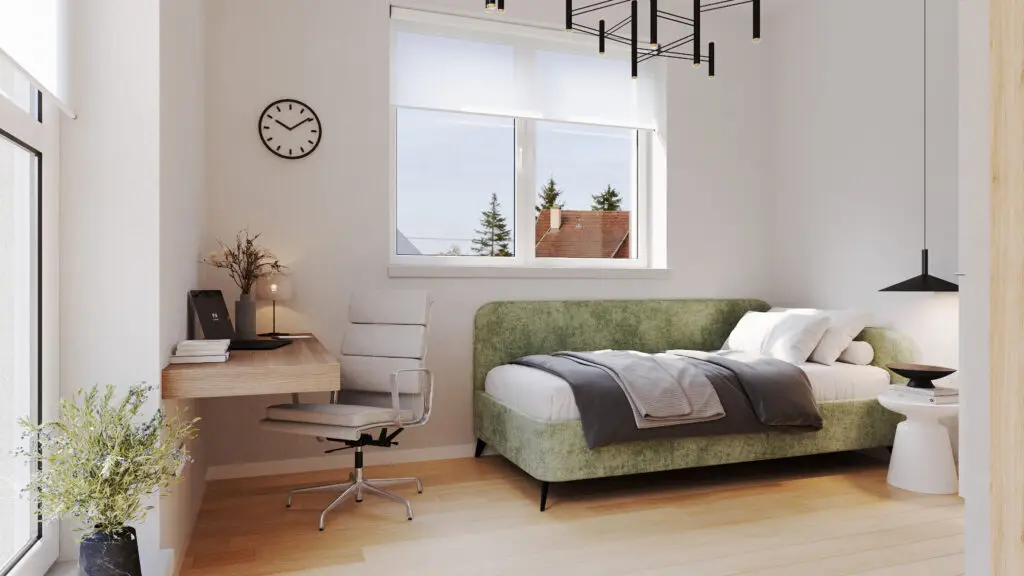 Modern eingerichtetes Schlafzimmer mit Arbeitsplatz im Wohnprojekt Reihenweise Grün in Klagenfurt
